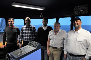 SRS course delegates and instructor in the simulator at the NMCI