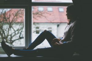 lady looking out window