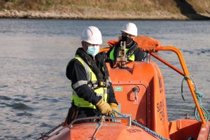 NMCI Instructors in a boat